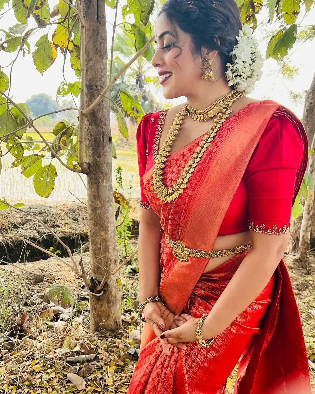 Shamna Kasim Wearing Beautiful Jewellery Orange Saree